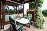 Ferienwohnung in Rettin - Bauernferienhof Kluvetasch Seestern - &Uuml;berdachte Terrasse Seestern Ferienhof Kluvetasch