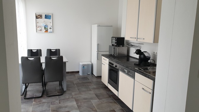 Ferienwohnung in B&ouml;rgerende - Appartement 2 - D&uuml;nenblick - K&uuml;che mit Ausgang Terrasse